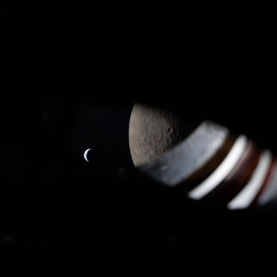 art002e012279 (April 6, 2026) - A view from the window of the Orion spacecraft approximately 9 minutes before Earthset during...